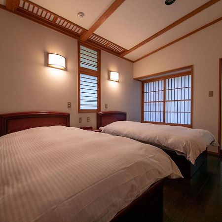 Baien Hotel Ойта Екстериор снимка
