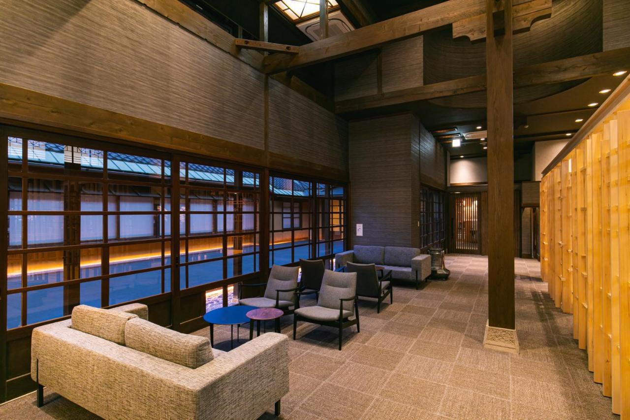 Baien Hotel Ойта Екстериор снимка