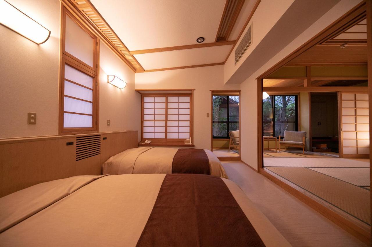 Baien Hotel Ойта Екстериор снимка