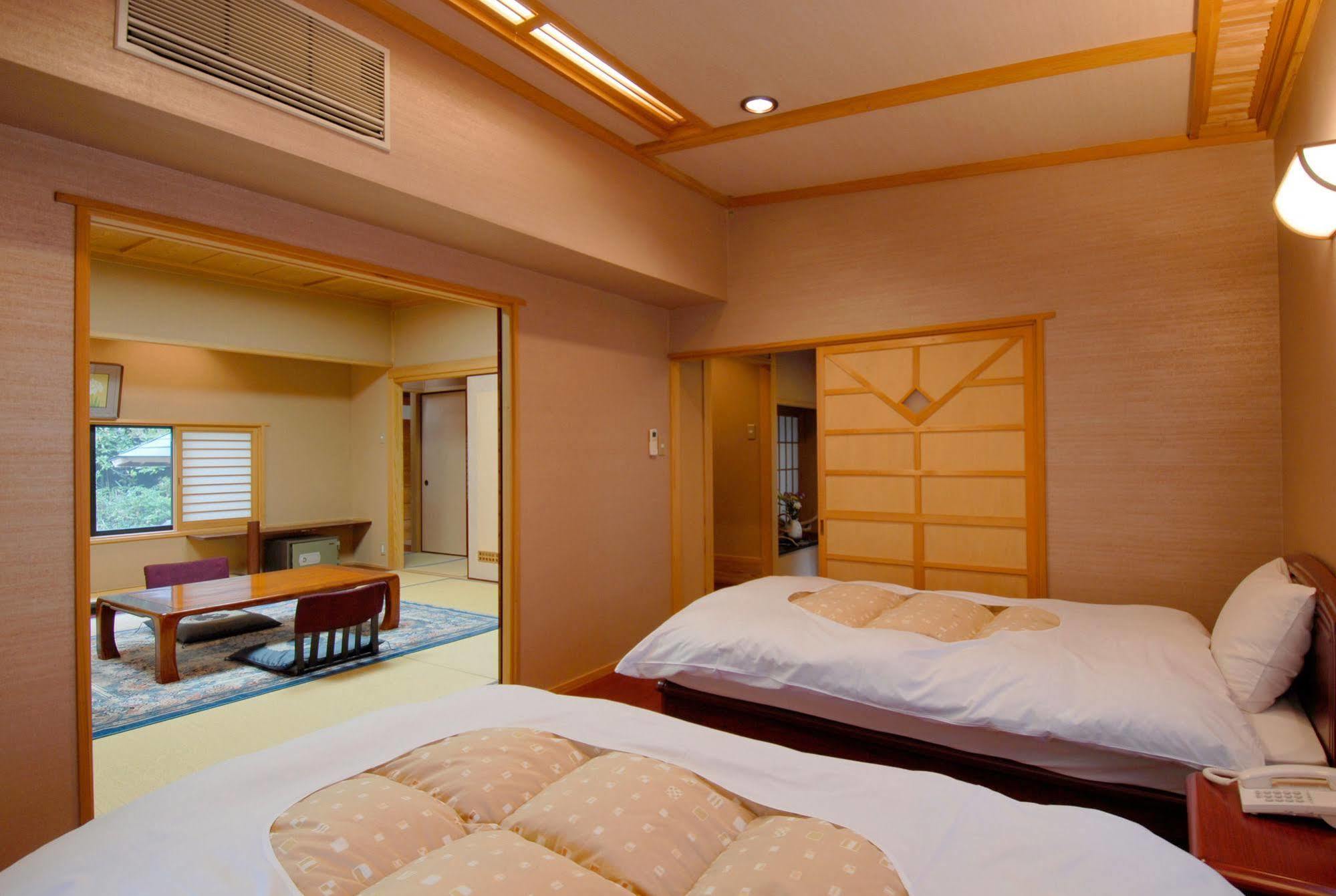 Baien Hotel Ойта Екстериор снимка